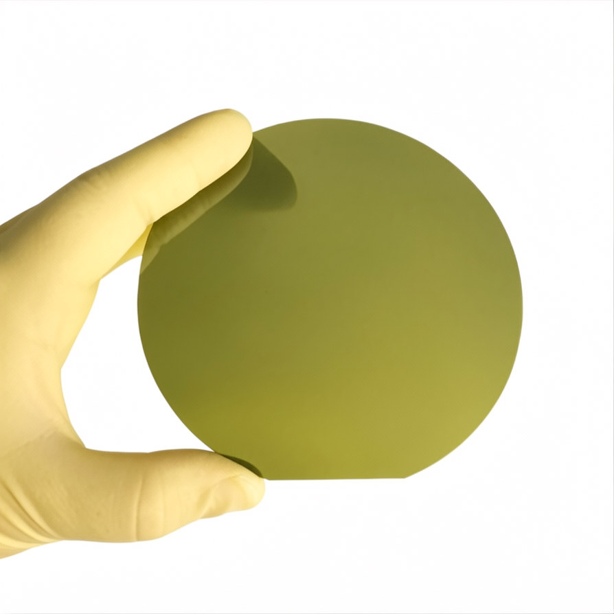 Fig. 1 — SiC epitaxial wafer surface. As device voltage ratings rise, epitaxial thickness, doping uniformity, and defect density become the binding constraint on yield.